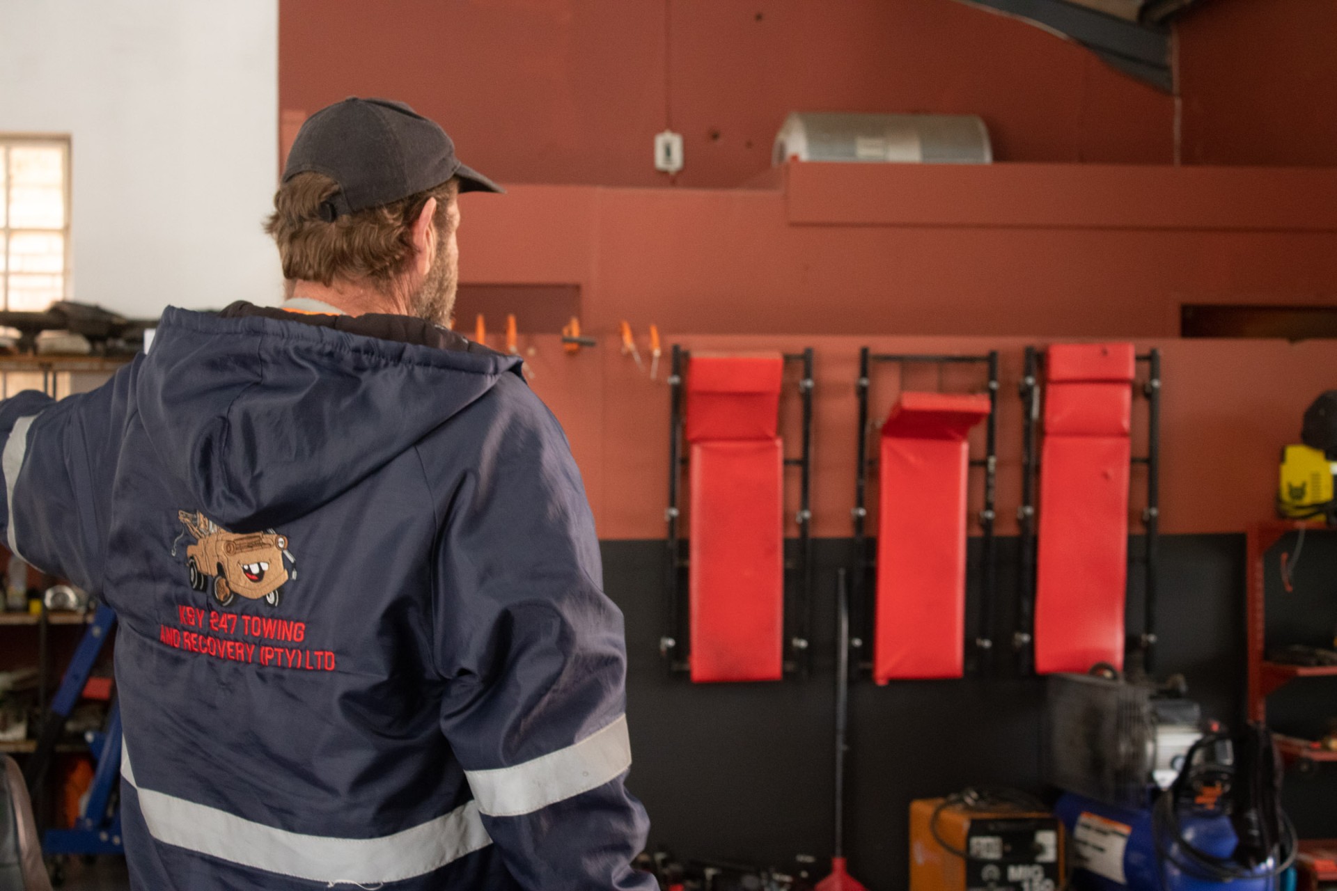 Mechanic working in the KBY 247 workshop